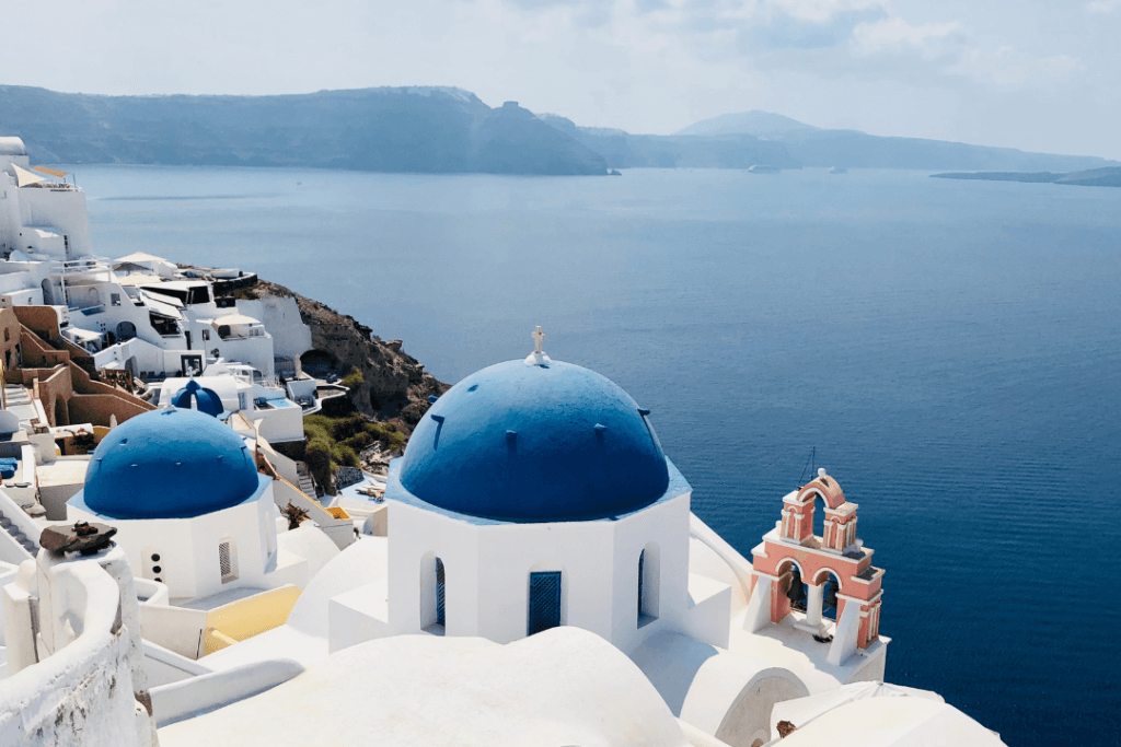 The iconic blue domes of Santorini in Greece