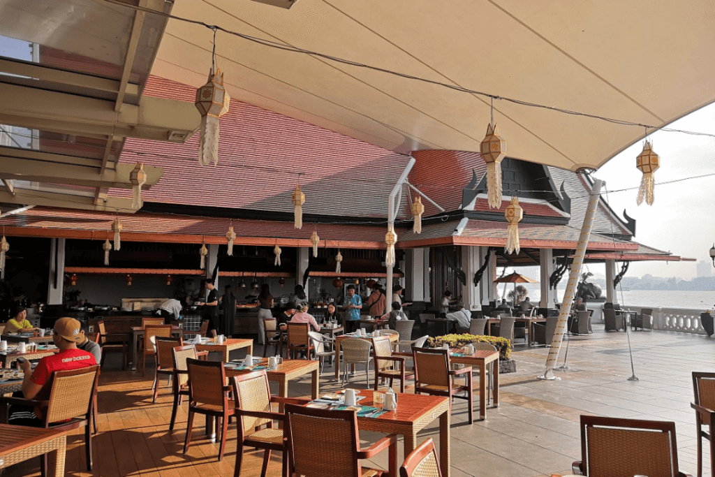 The outdoor breakfast terrace at the Market restaurant at Anantara Riverside Bangkok