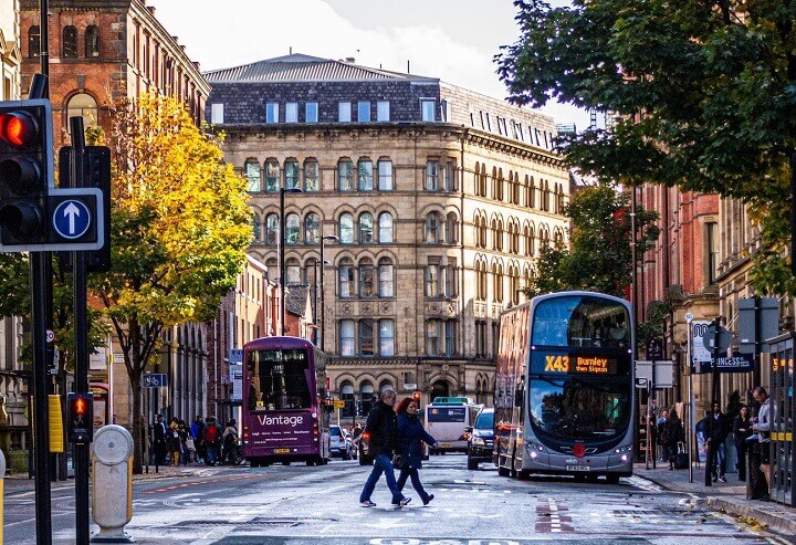 A busy street in Manchester city centre