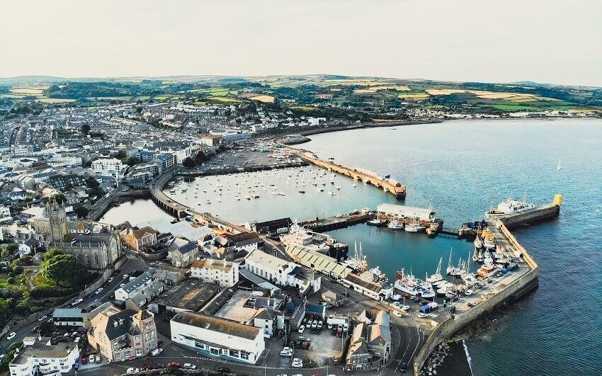Where to stay in Penzance, Cornwall - aerial shot of the Penzance Harbour and town centre