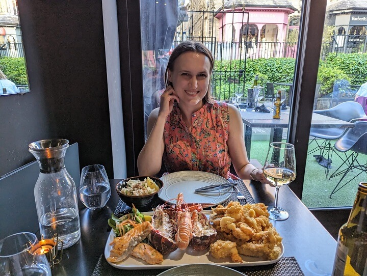Ksenia enjoying her seafood platter at FISK