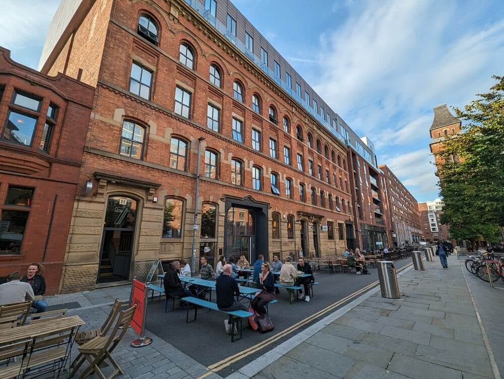 The Best Restaurants in Ancoats hero image - the outdoor seating area in Cutting Room Square