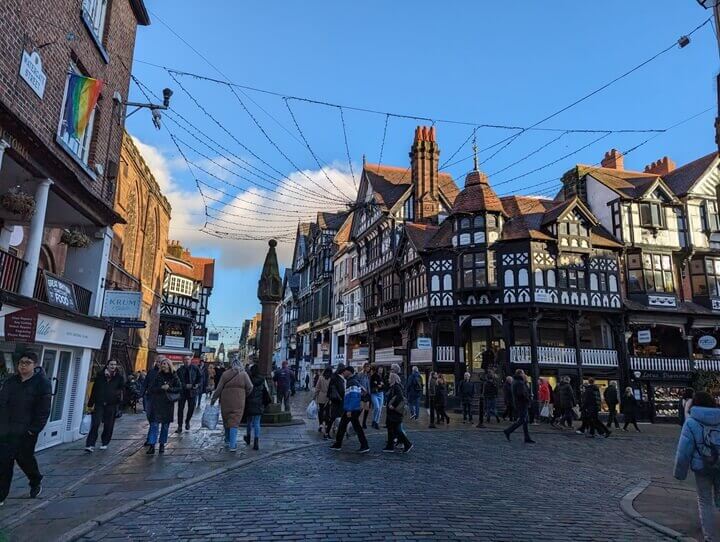 How to Spend a Day in Chester Hero Shot - a central square in Chester with the Medieval-style buildings and Chester Rows