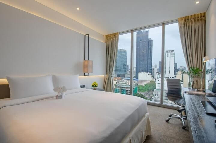 Room with sweeping city views at Amara Bangkok Hotel in Silom