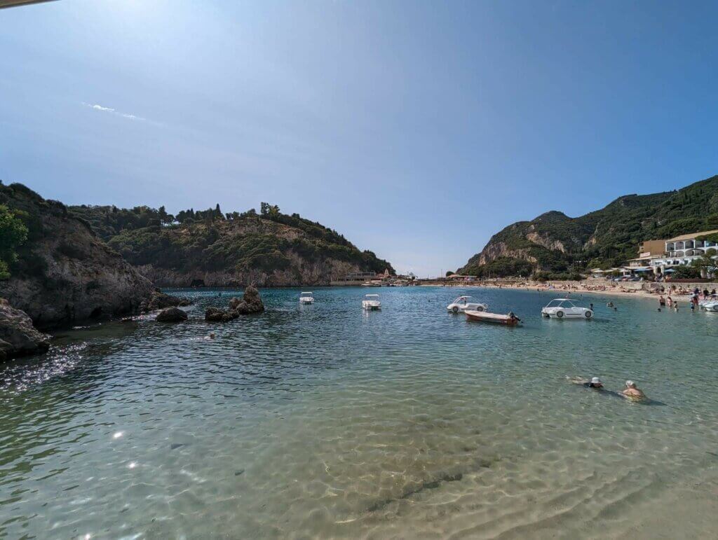 The crystal clear waters of the Agios Spiridon beach in Paleokastritsa